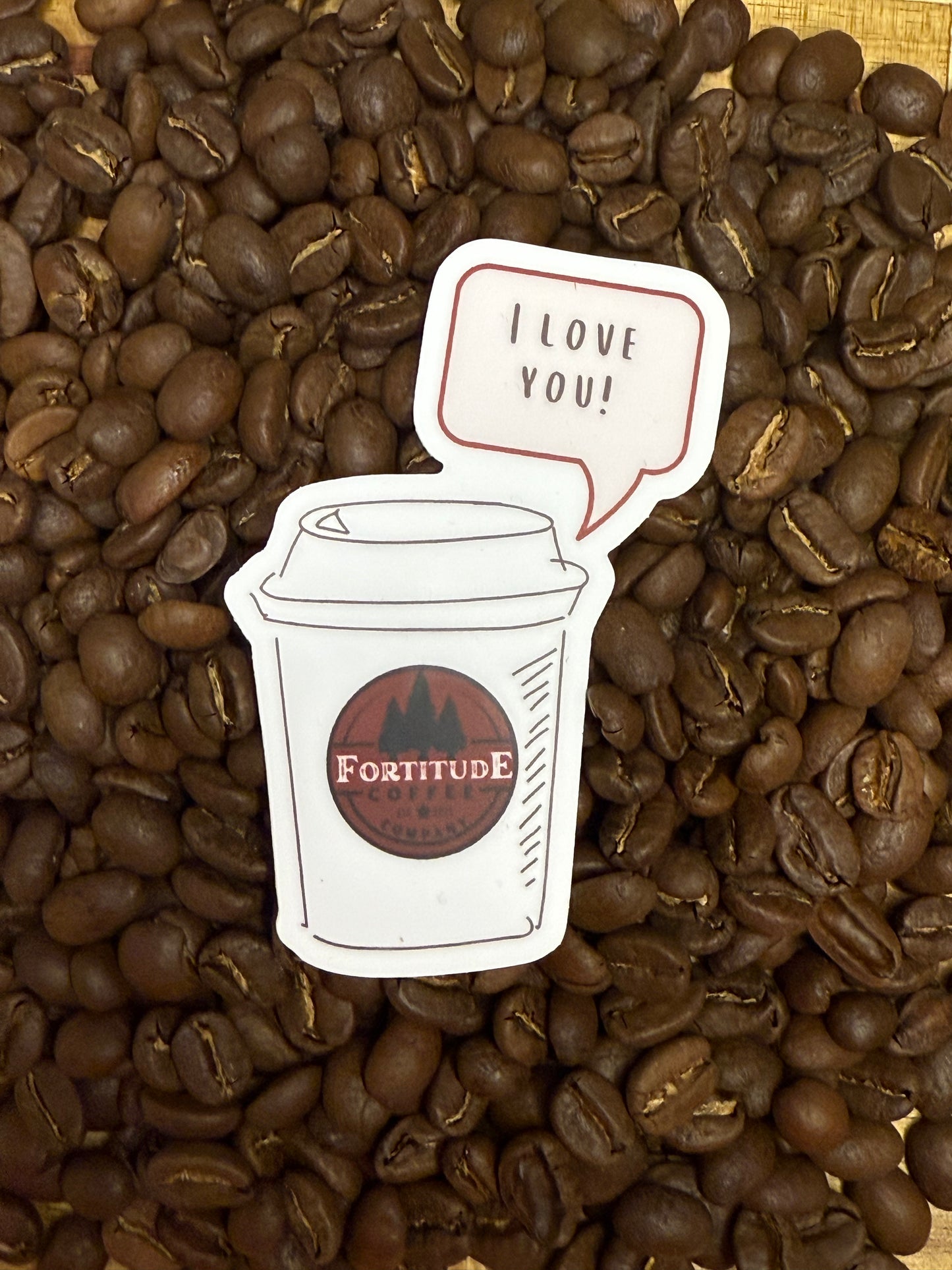 Fortitude coffee cup says, " I love you" on a sticker